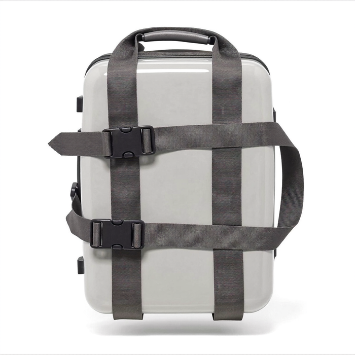 PackLite Luggage Straps in dark gray wrapped around a carry-on suitcase on white background
